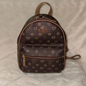 Claire’s Brown Tan LOVE Hearts Jewels Crowns Print Faux Leather Mini Backpack
